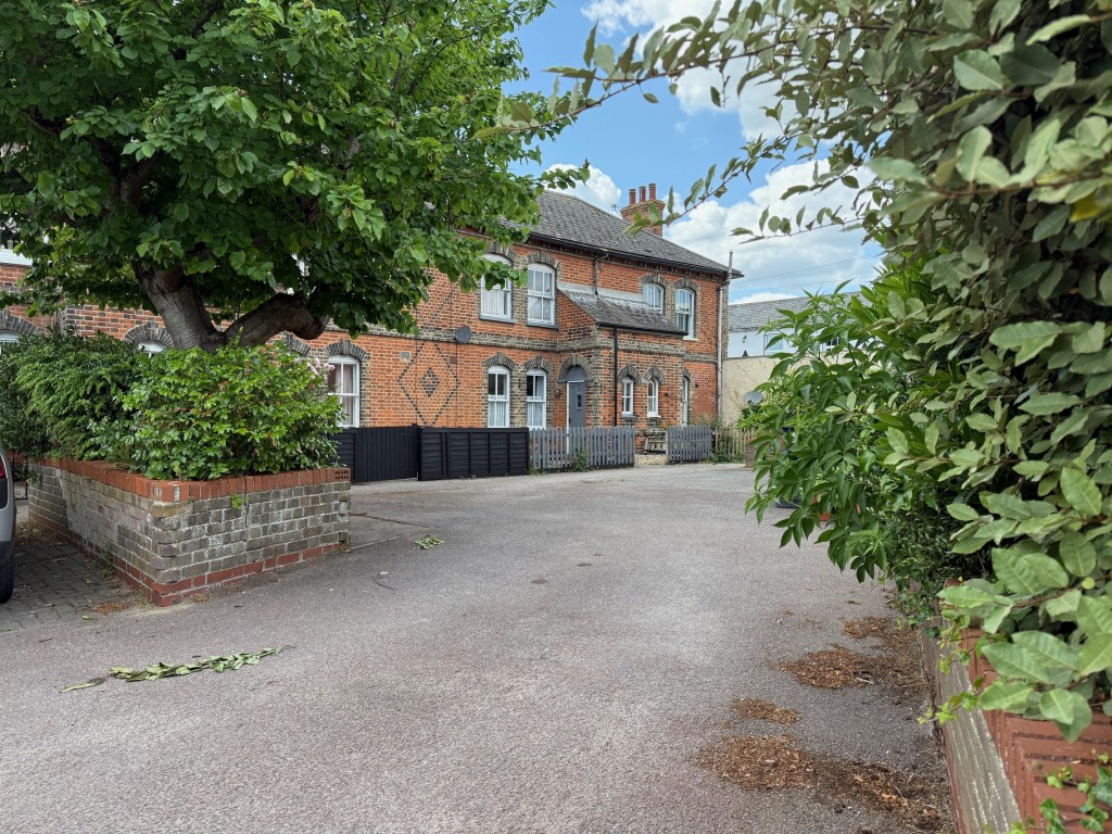Lot: 110 - THREE-BEDROOM END-TERRACE COTTAGE FOR IMPROVEMENT - General view of the cottages at Angel Gate